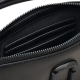 Close up of back bag, showing texture of the leather fabric