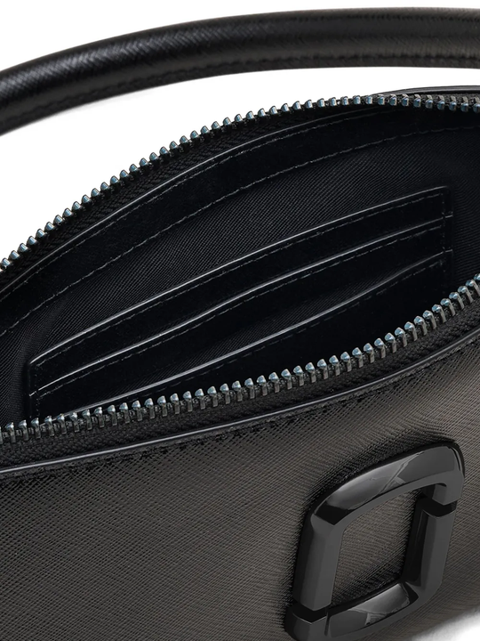 Close up of back bag, showing texture of the leather fabric