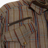 Close up of Brown jacket, showing texture of the 89% viscose/ 11% wool fabric