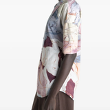 Tan shirt worn by a person, showing the shirt  fit