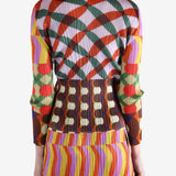 Pink shirts worn by a person, showing the shirts fit