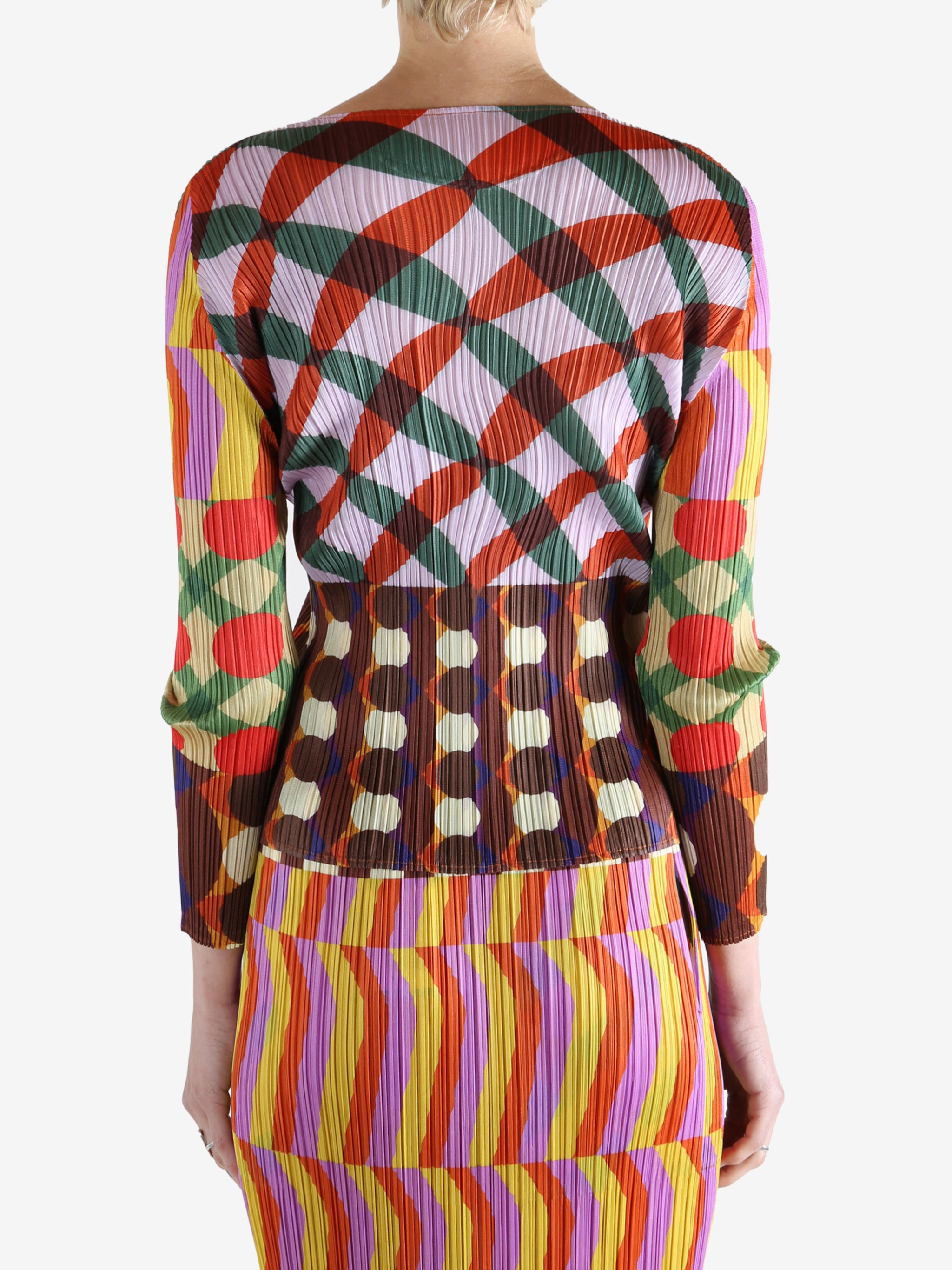 Pink shirts worn by a person, showing the shirts fit