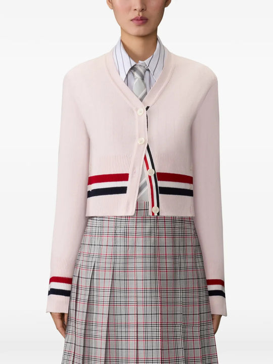 Pink knitwear, full body view