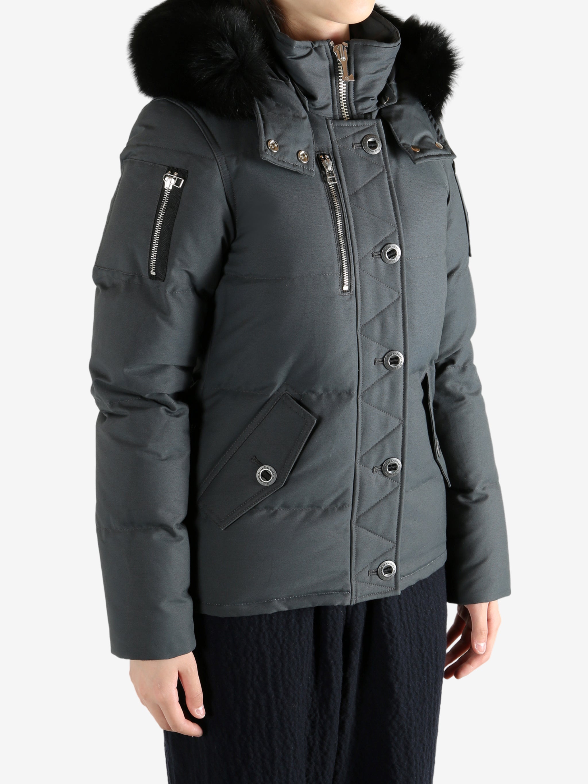 Black jackets worn by a person, showing the jackets fit