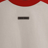 Close up of red t-shirt,showing texture of the cotton fabric