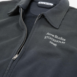 Close up of Black hoodie, showing texture of the 100% cotton fabric