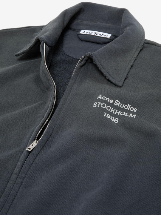 Close up of Black hoodie, showing texture of the 100% cotton fabric