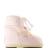 Pink boots, side view