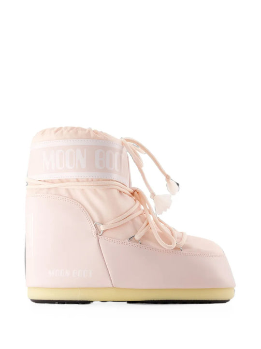 Pink boots, side view