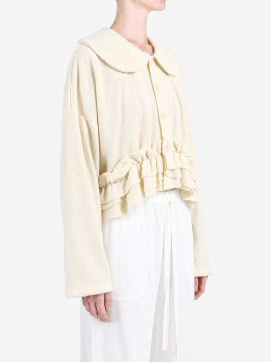 Tan knitwear, front view