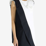 Navy dress worn by a person, showing the dress' fit