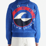 Blue sweater worn by a person, showing the sweaters fit