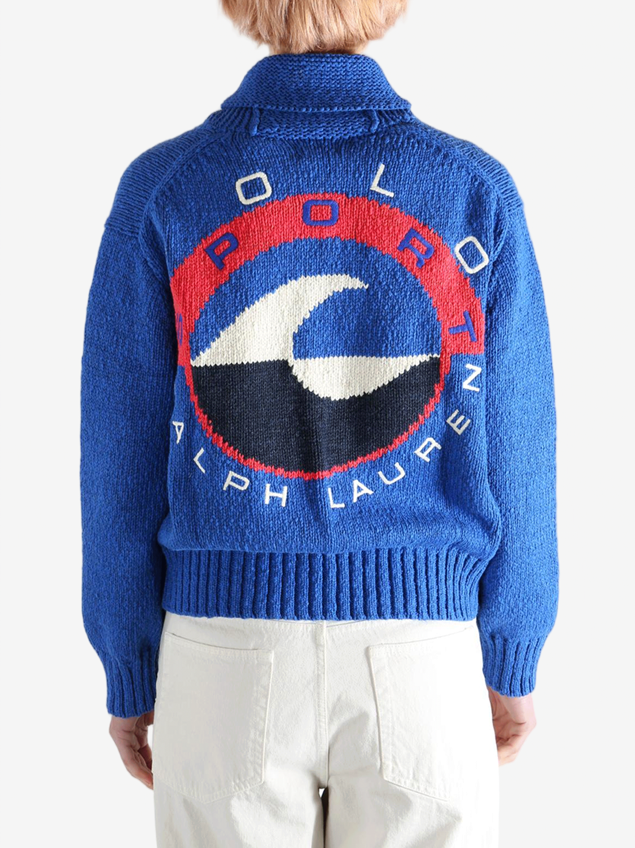 Blue sweater worn by a person, showing the sweaters fit