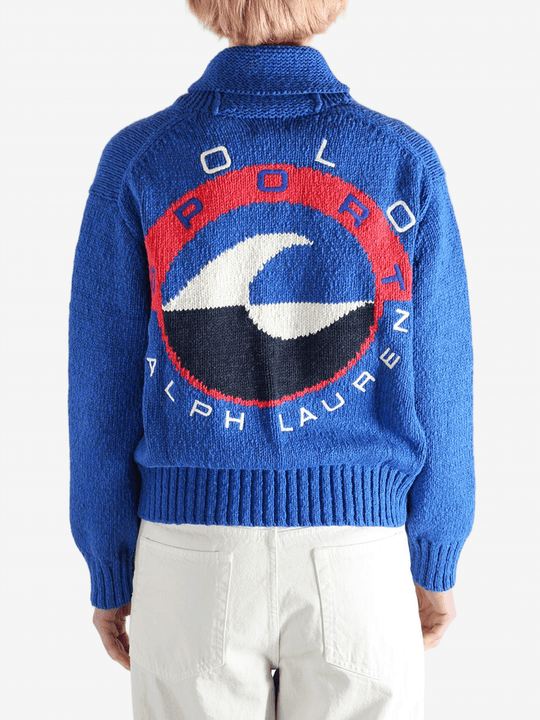 Blue sweater worn by a person, showing the sweaters fit
