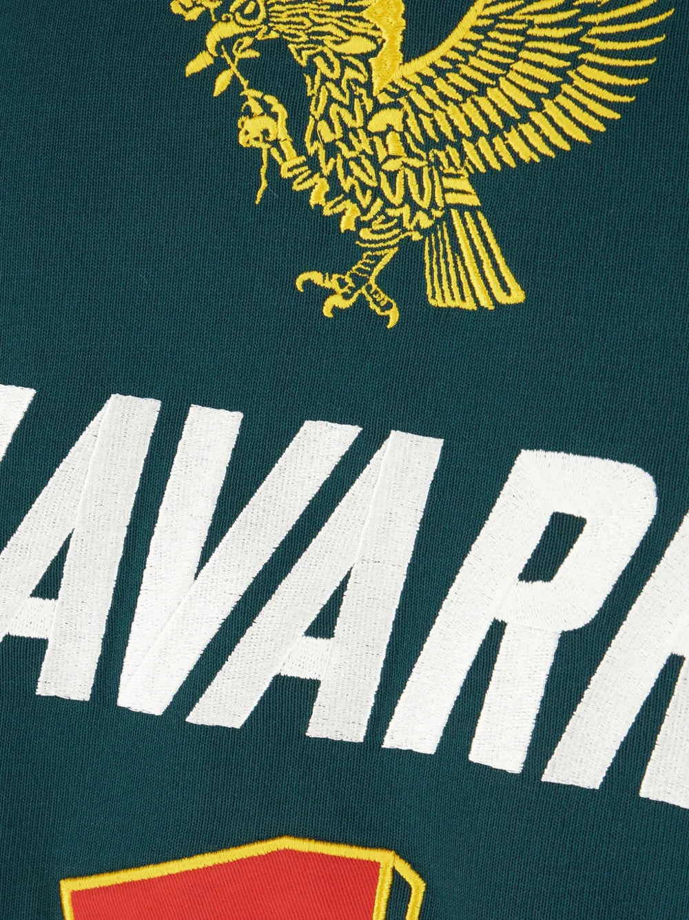 Close up of Green hoodie, showing texture of the 87% cotton/ 13% polyester fabric