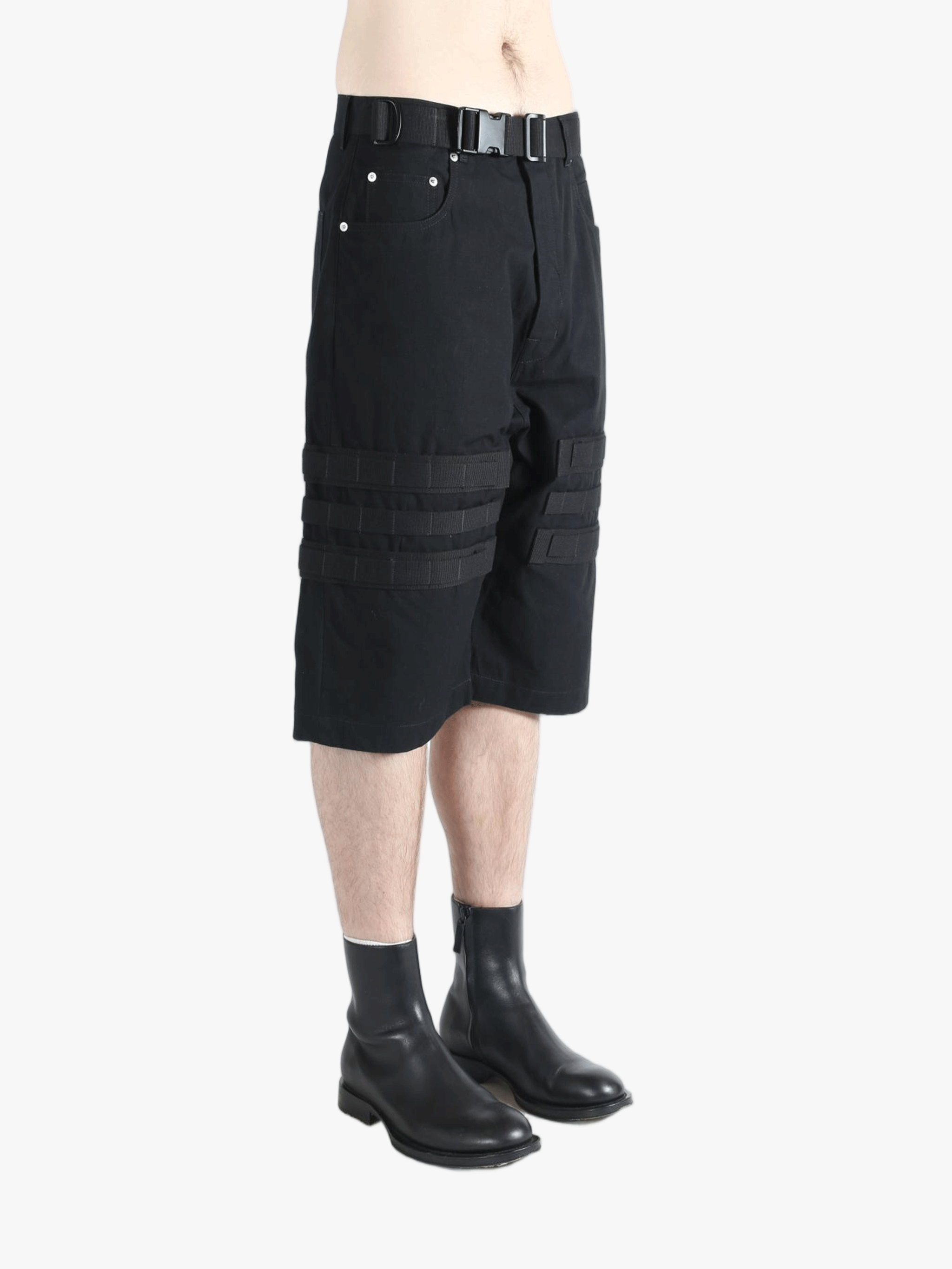 Black shorts worn by a person, showing the shorts's fit