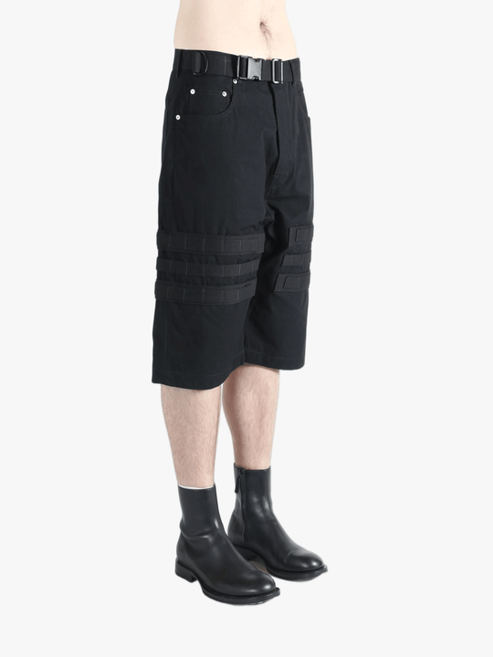 Black shorts worn by a person, showing the shorts's fit