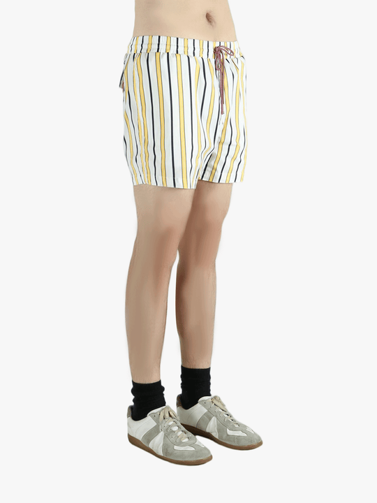 Yellow short worn by a person, showing the short fit