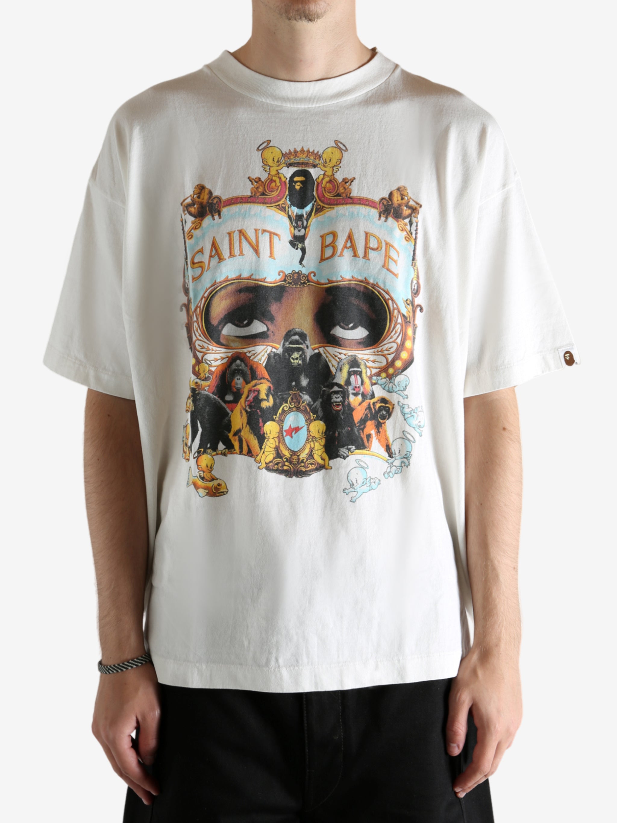 White t-shirt worn by a person, showing the t-shirt's fit