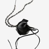 Black necklace, front view