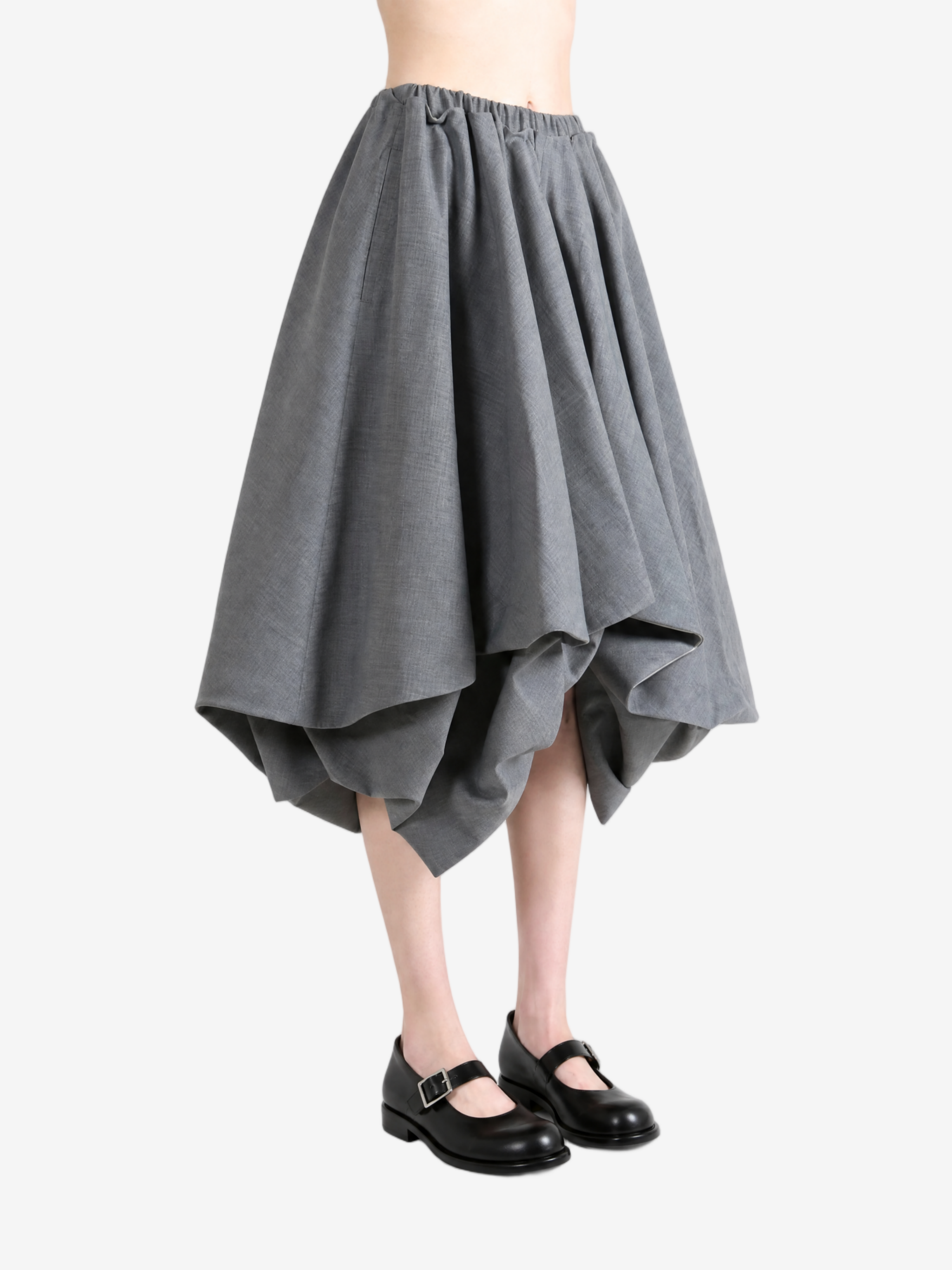Grey skirt worn by a person, showing the skirt fit
