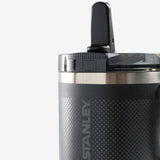 Close up of black tumbler, showing texture of the stainless steel fabric