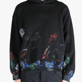 Black hoodie worn by a person, showing the  hoodies fit