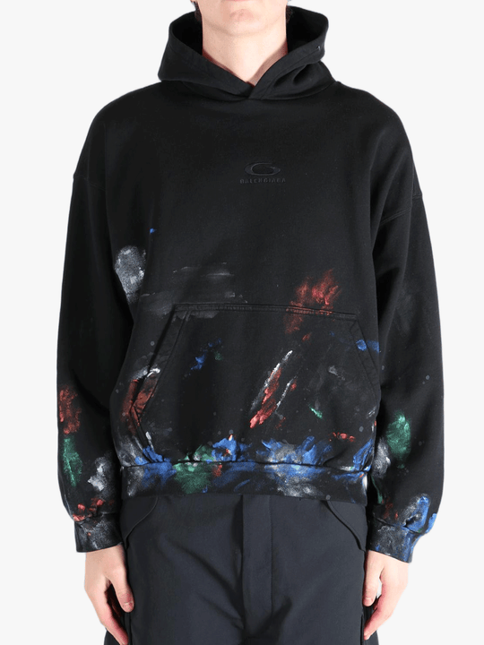 Black hoodie worn by a person, showing the  hoodies fit