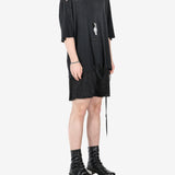 Black t-shirt, worn by a person, showing the t-shirt's fit