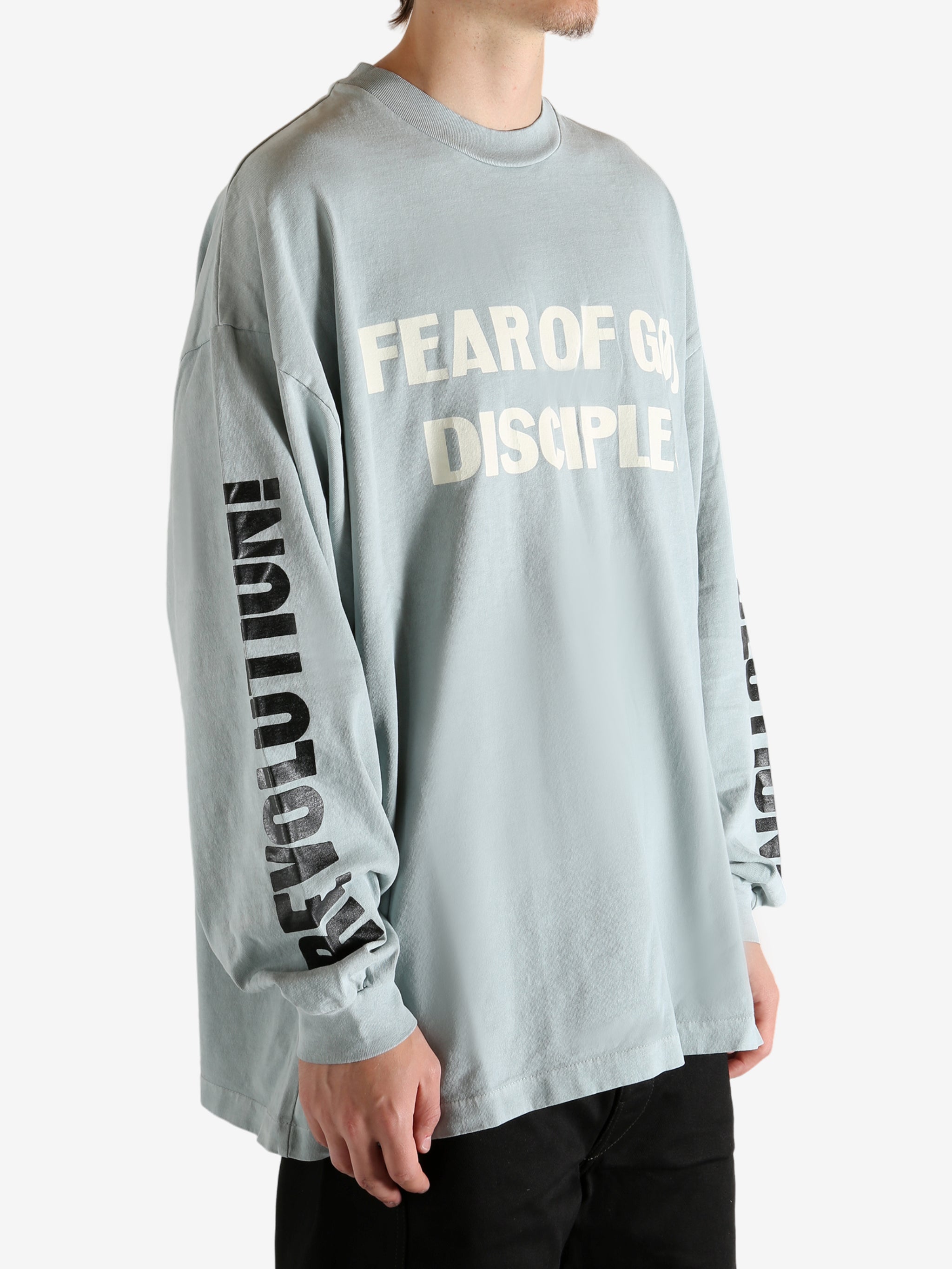 white shirts worn by a person, showing the shirts fit