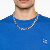 Close up blue T-shirt ,showing texture of the cotton fabric.