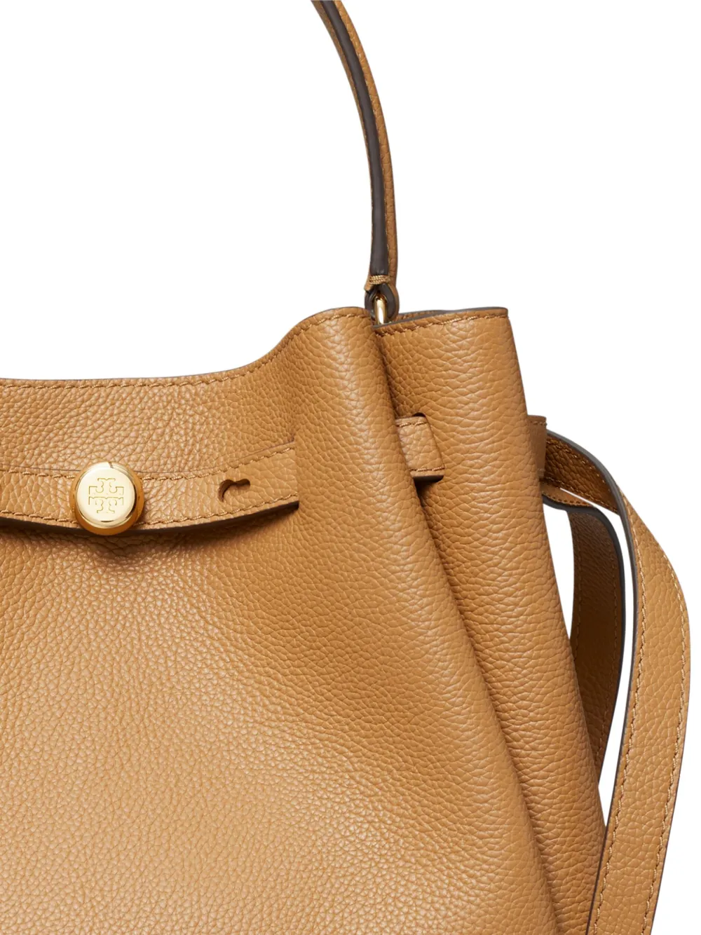 Close up of brown bag, showing texture of the leather fabric