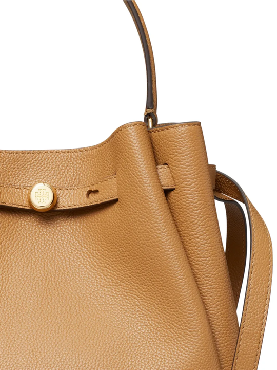 Close up of brown bag, showing texture of the leather fabric