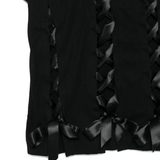 Close up of black t-shirt,showing texture of the cotton fabric.