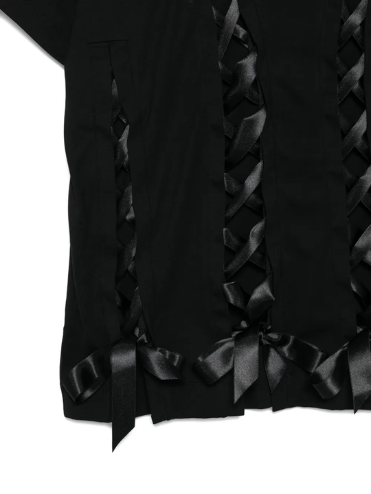 Close up of black t-shirt,showing texture of the cotton fabric.