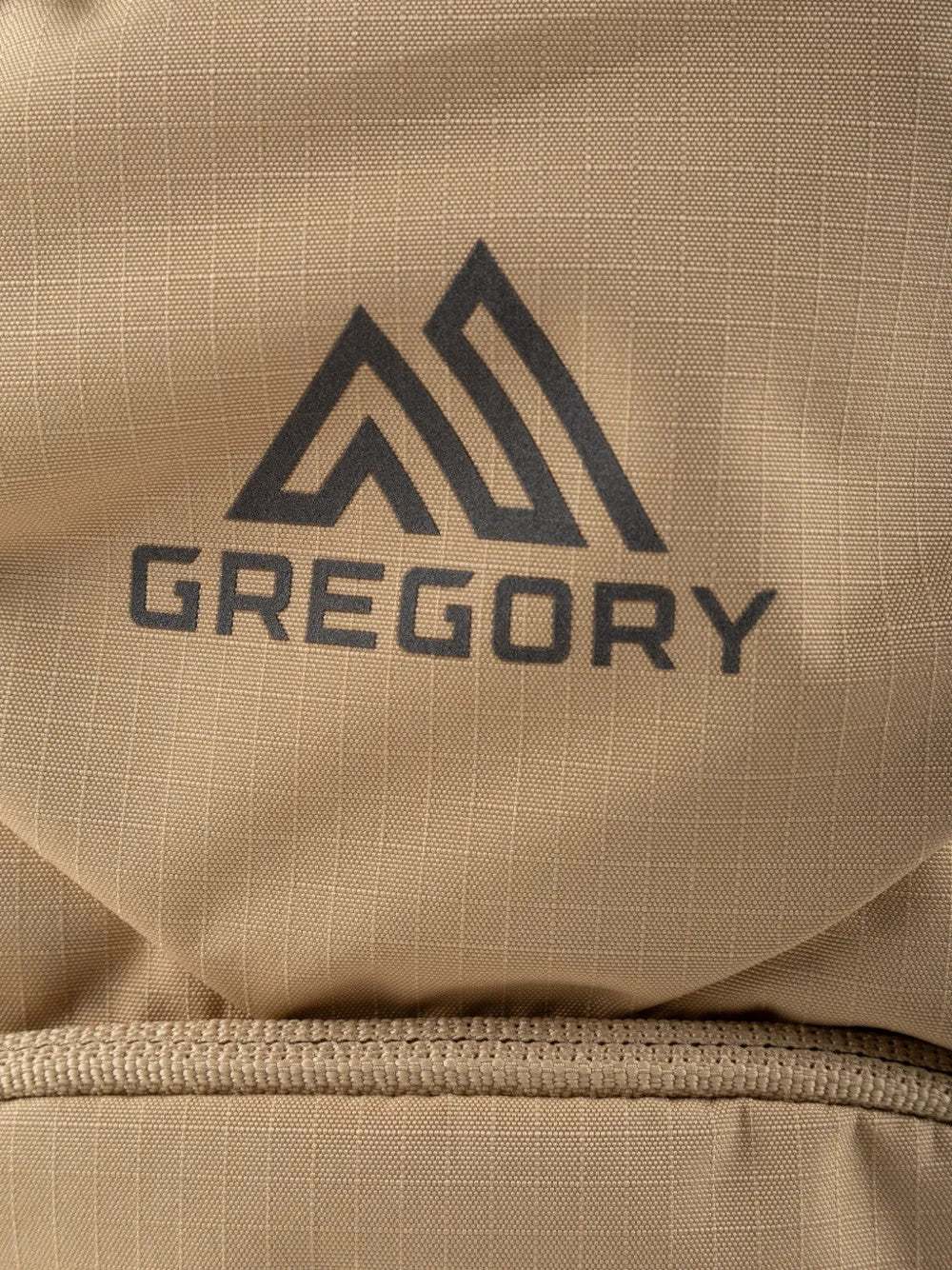 Close up of Tan bag, showing texture of the mesh fabric