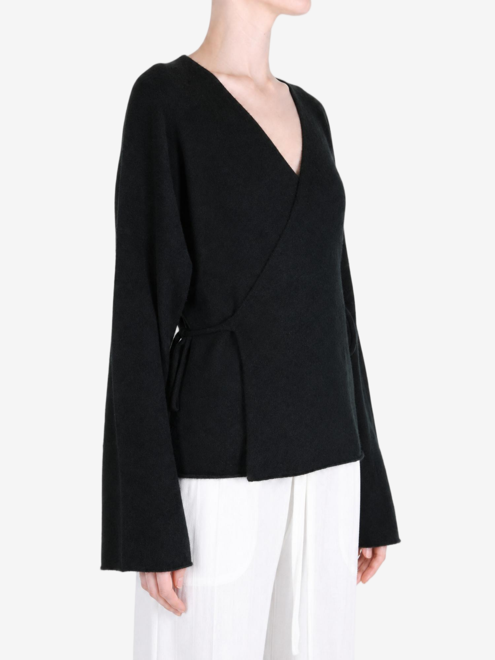 Black jacket worn by a person, showing the jacket fit