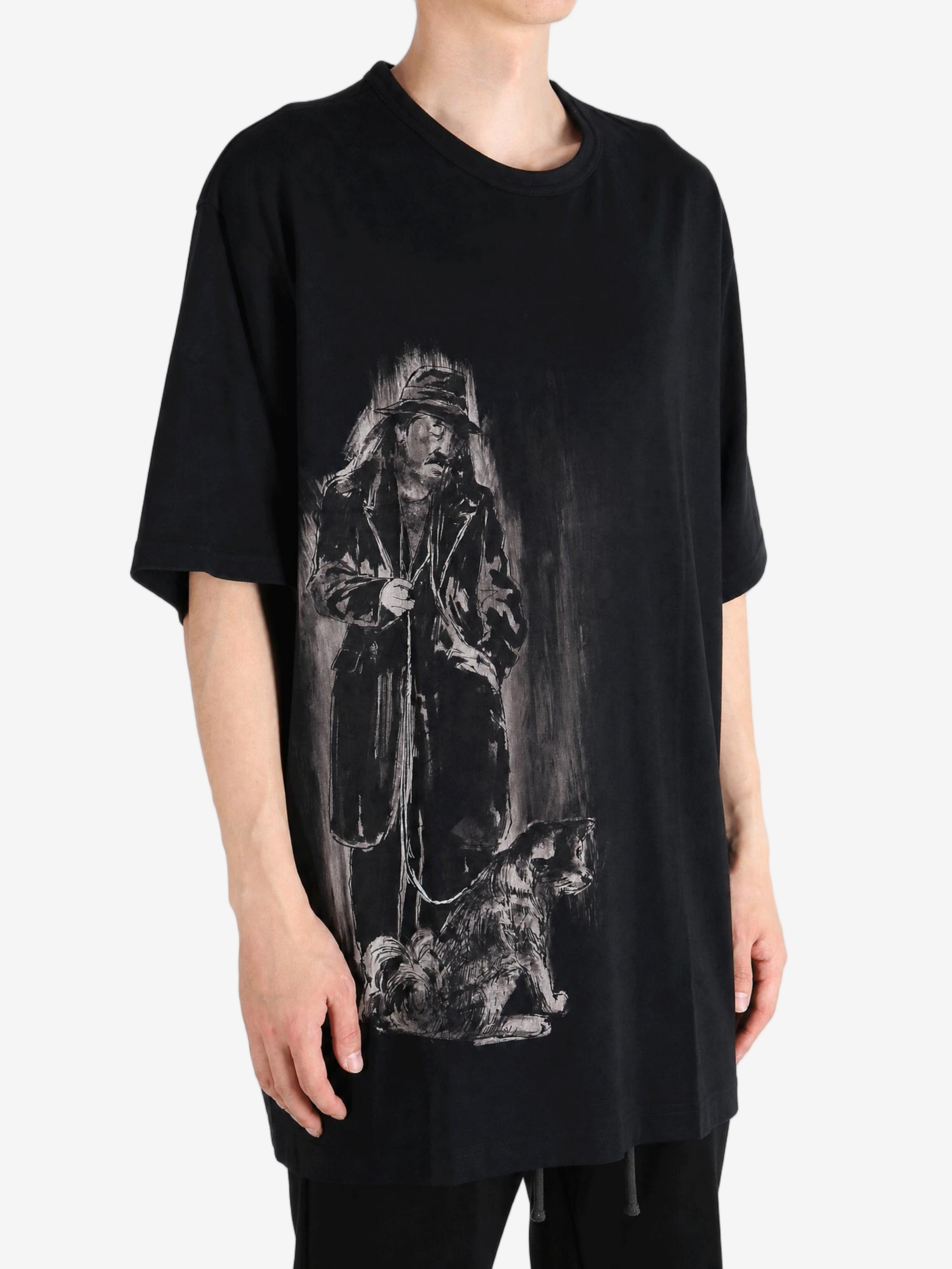 Black t-shirt worn by a person, showing the t-shirt fit