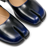 Close up of the black derbys, showing texture of the leather