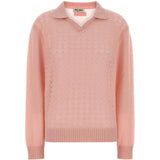 Pink knitwear, front view