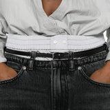 Close up of grey jeans, showing texture of the cotton fabric