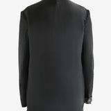 Black jacket worn by a person, showing the jacket's fit