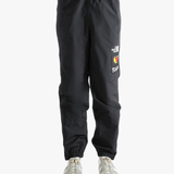 Black pants worn by a person showing the pants fit