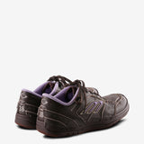 Brown sneakers, back view