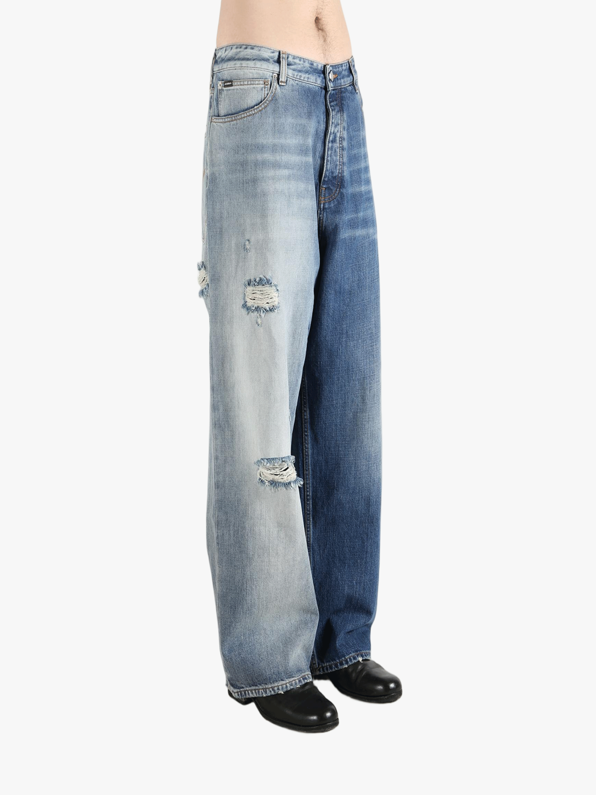 blue jeans worn by a person, showing the jeans  fit