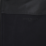 Close up of black hoodie, showing texture of the Cotton fabric