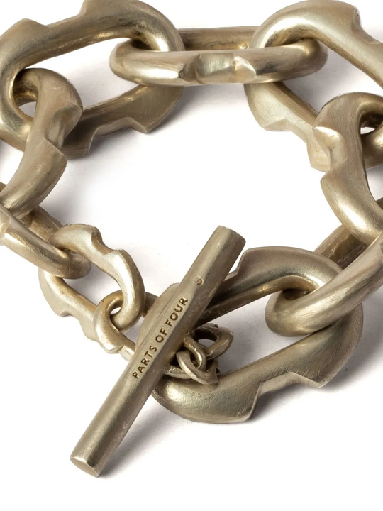 Close up of Yellow jewelry, showing detail