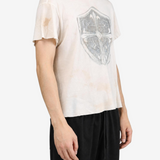 Tan t-shirt worn by a person, showing the t-shirt fit