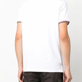 White shirt worn by a person, showing the shirt's fit