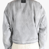 White jackets worn by a person, showing the jackets fit